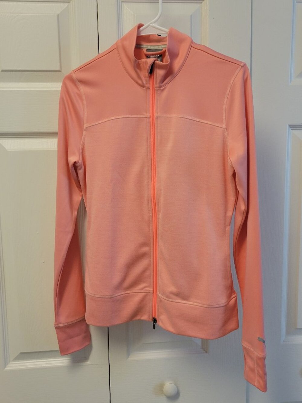 Puma Women's Golf Jacket. Peach color. Size Small. EUC